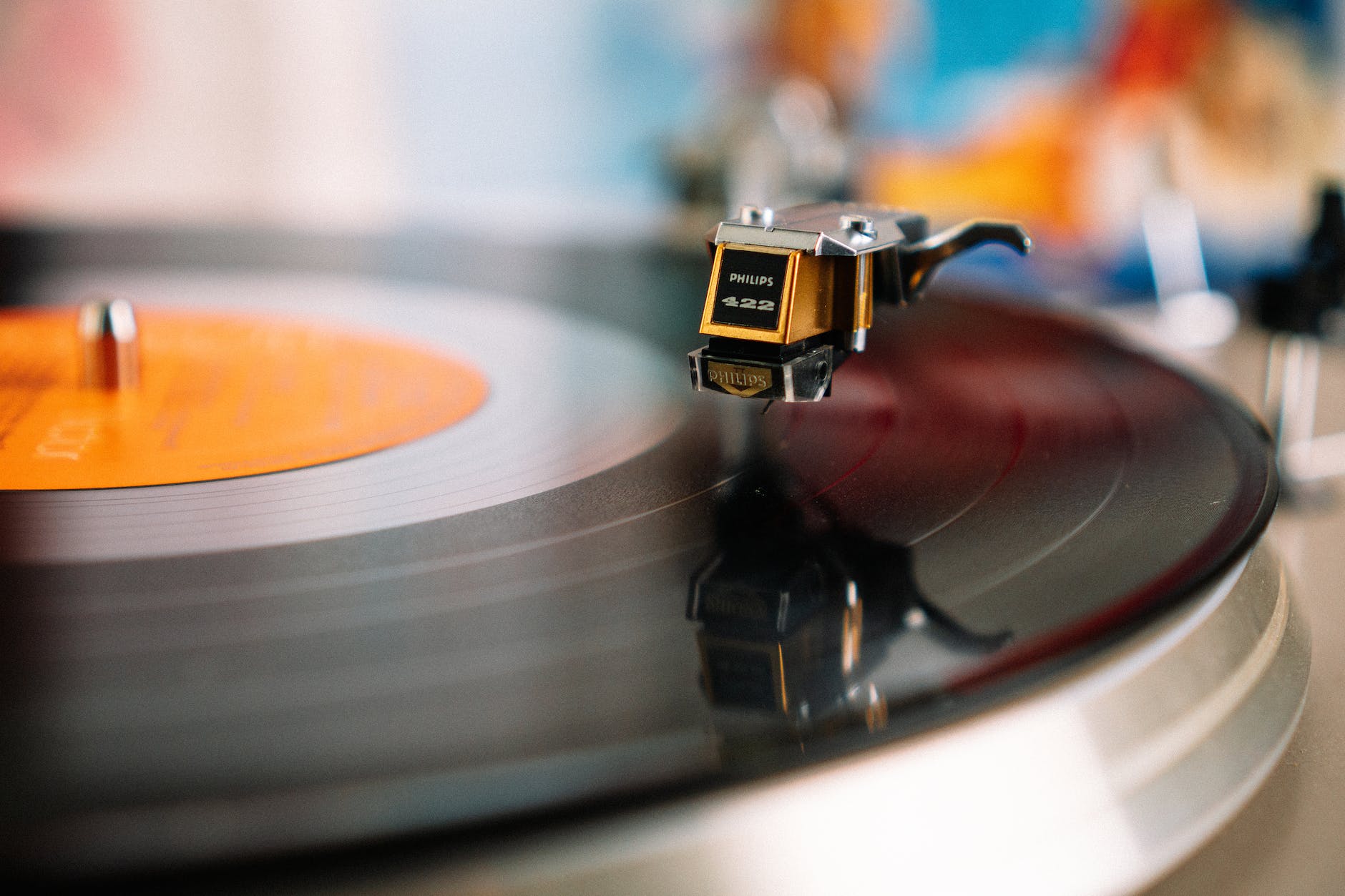 Photo by Matthias Groeneveld on <a href="https://www.pexels.com/photo/retro-turntable-playing-vinyl-disc-in-living-room-4200747/" rel="nofollow">Pexels.com</a>